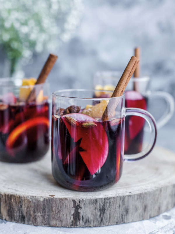 Mugs of spiked mulled cider