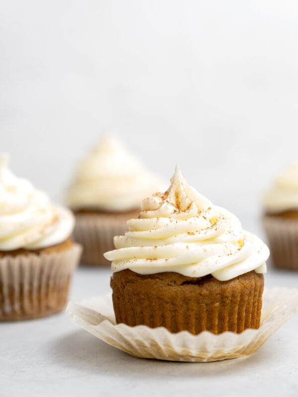 Gluten free pumpkin cupcakes with frosting.